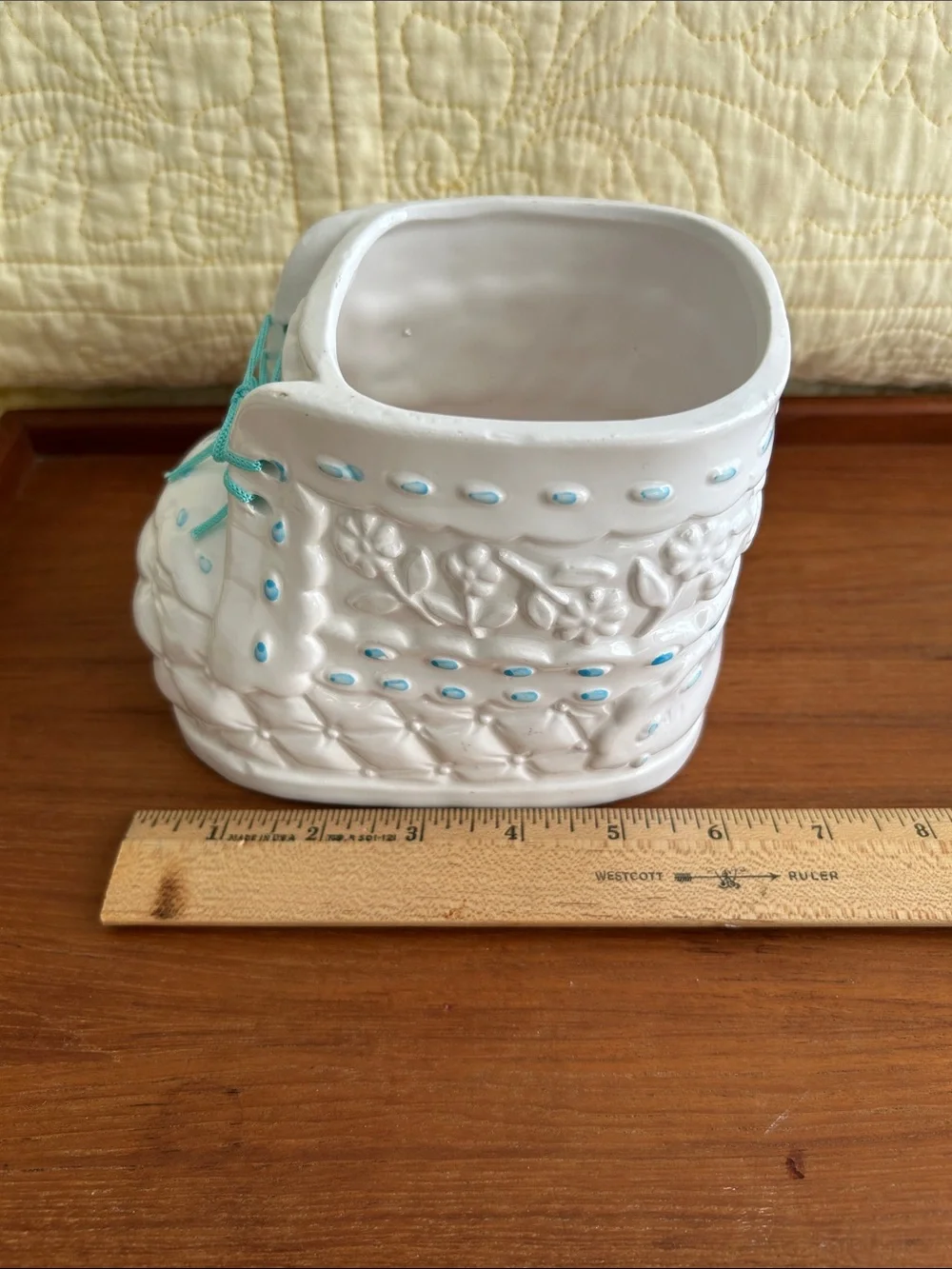 Vintage Ceramic baby bootie planter Embossed floral design and turquoise ribbon.